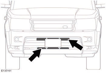 Using a hose pipe, direct clean water through the front bumper (where shown),