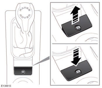 With the ignition turned on, press the brake pedal and press down on the EPB