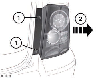 1. With the tailgate open, remove the two screws from the inner edge of the unit.