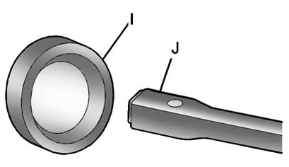 5. Insert the open end of the extension (J) through the hole in the rear bumper