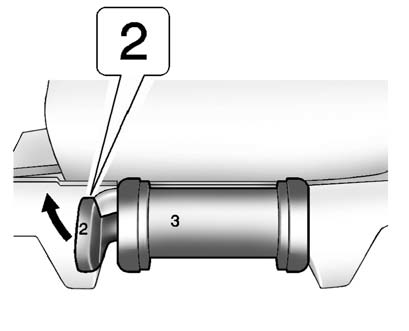 4. Unlatch the seat from the floor by lifting lever “2” next to the carrying